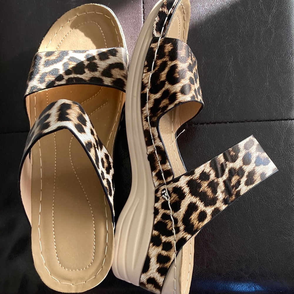 Leopard sandals. New without  tags. Light weight, heel height 3 inches.